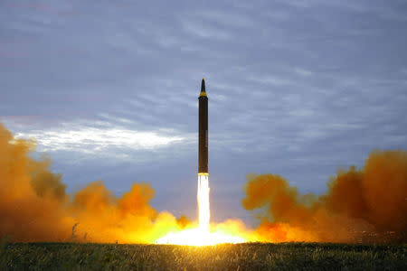 A missile is launched during a long and medium-range ballistic rocket launch drill in this undated photo released by North Korea's Korean Central News Agency (KCNA) in Pyongyang on August 30, 2017. KCNA/via REUTERS