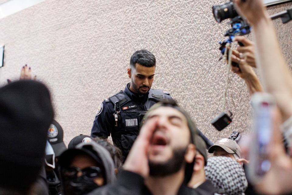 Activists hold a sit-in organized by the Palestinian Youth Movement at Scotiabank Plaza, in Toronto, on Nov. 17, 2023. 