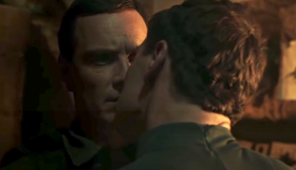 David and Walter kissing