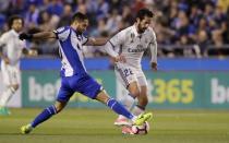 Football Soccer- Spanish La Liga Santander - Deportivo v Real Madrid - Riazor stadium, A Coruna, Spain - 26/04/17 Deportivo's Florin Andone (L) and Real Madrid's Francisco "Isco" Alarcon in action. REUTERS/Miguel Vidal