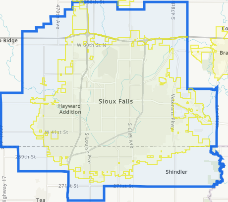 A map of the joint jurisdictional area shared by Sioux Falls and Minnehaha County. Land within the blue polygon but outside the yellow polygon is part of the joint jurisdictional area.