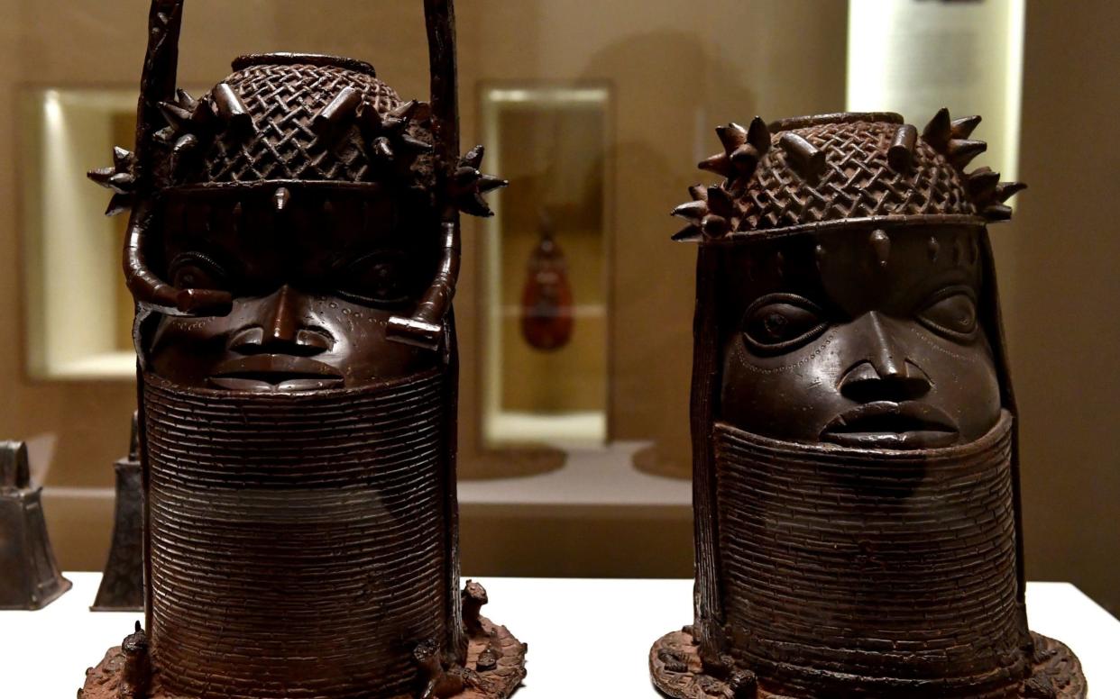 Relics from the 18th century Kingdom of Benin on display at the Quai Branly, a museum featuring the indigenous art and cultures of Africa - AFP