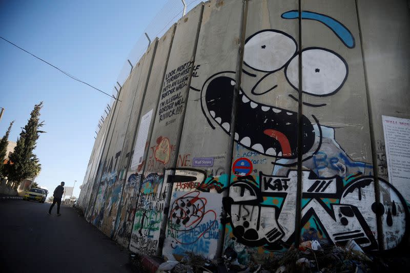 Mural is seen on a section of the Israeli concrete barrier in Bethlehem in the Israeli-occupied West Bank