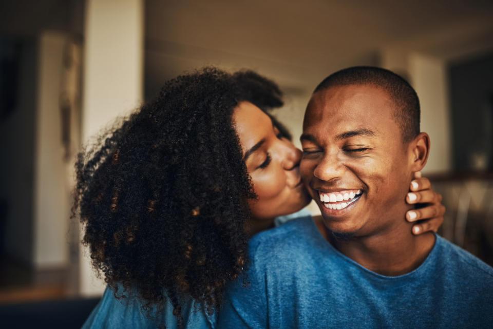 Shot of an affectionate young couple relaxing at home