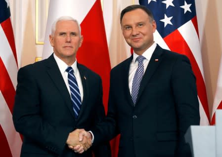 FILE PHOTO: U.S. Vice President Mike Pence and Polish President Andrzej Duda shake hands during a joint news conference at Belvedere Palace in Warsaw