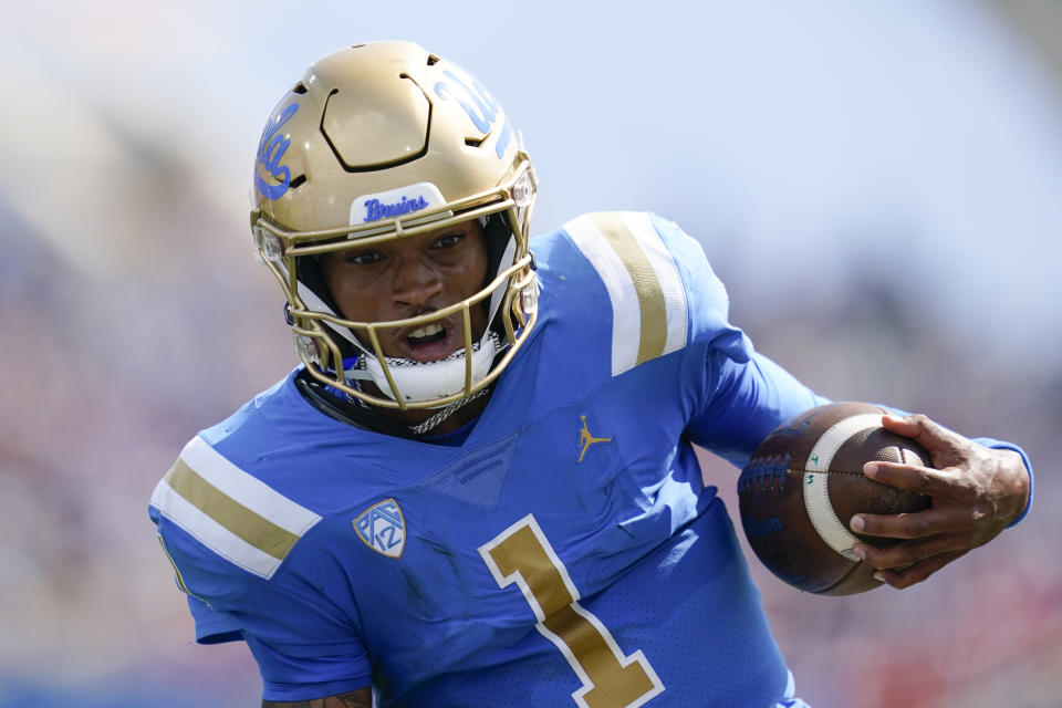 UCLA quarterback Dorian Thompson-Robinson (1) runs to the end zone for a touchdown during the first half of an NCAA college football game against Utah in Pasadena, Calif., Saturday, Oct. 8, 2022. (AP Photo/Ashley Landis)