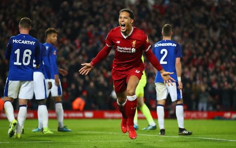 Virgil van Dijk of Liverpool celebrates as he scores their second goal during the Emirates FA Cup Third Round match between Liverpool and Everton at Anfield on January 5, 2018 in Liverpool, England. - Credit:  Getty Images 
