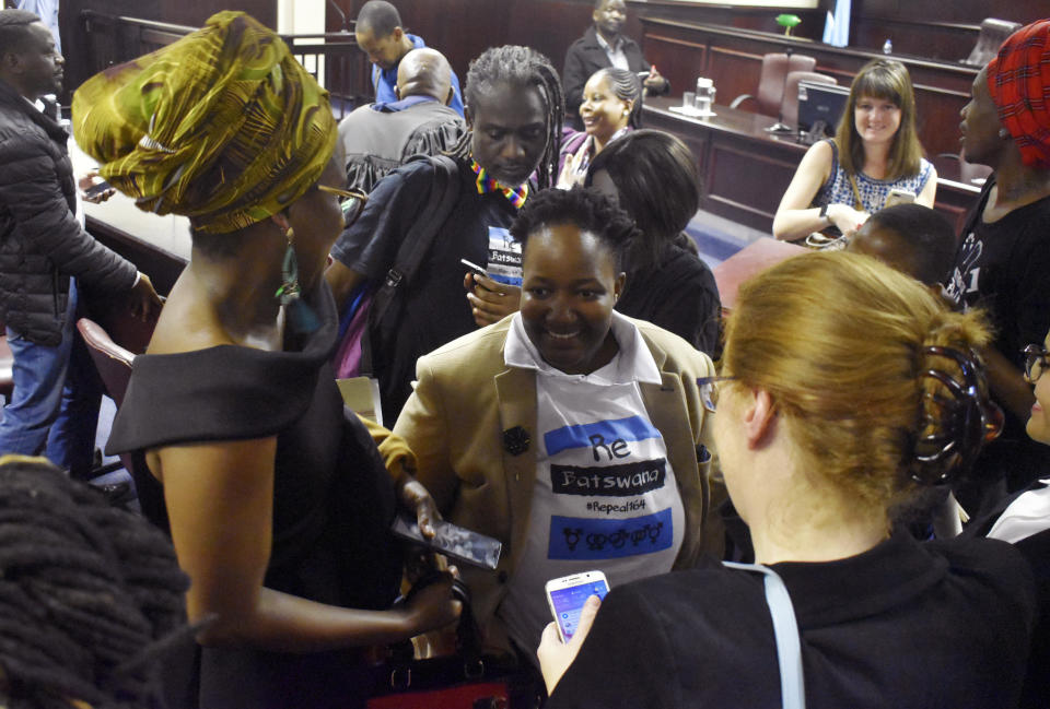 Activists celebrate inside the High Court in Gaborone, Botswana, Tuesday June 11, 2019. Botswana became the latest country to decriminalize gay sex when the High Court rejected as unconstitutional sections of the penal code that punish same-sex relations with up to seven years in prison. (AP Photo)