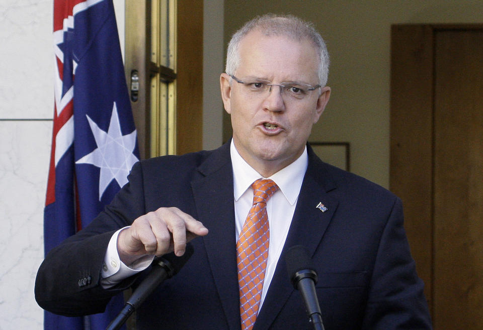 FILE - In this Feb. 13, 2019, file photo Australian Prime Minister Scott Morrison addresses the media at Parliament House in Canberra. Australia. Saturday, May 18, 2019 is the last possible date that Morrison could have realistically chosen to hold an election. (AP Photos/Rod McGuirk, File)