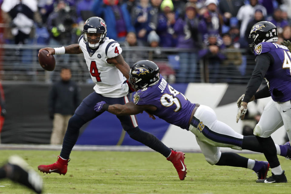 Quarterback Deshaun Watson of the Houston Texans is sacked by Ravens outside linebacker Matt Judon. (Photo by Todd Olszewski/Getty Images)