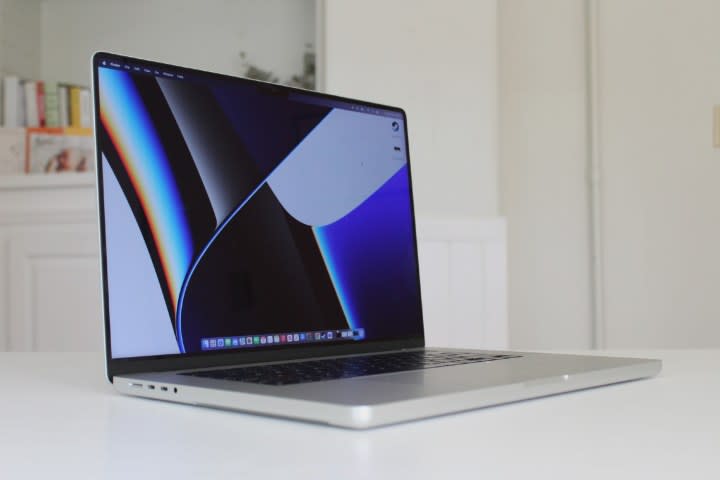 The MacBook Pro with the default wallpaper, which hides the notch.