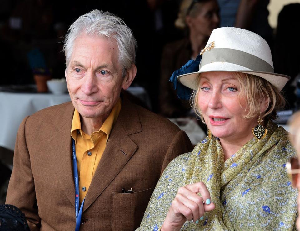 The drummer of The Rolling Stones pictured with his wife Shirley (AFP via Getty Images)