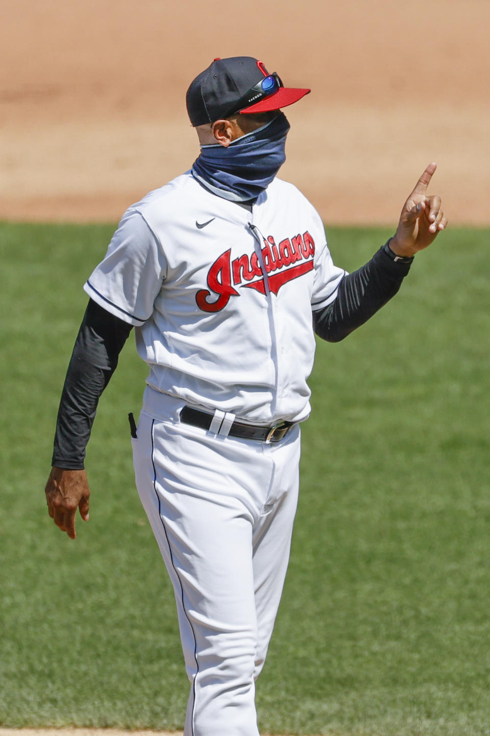 Cleveland Indians acting manager Sandy Alomar Jr. walks back to the dugout after making a pitching change against the Detroit Tigers during the fourth inning of a baseball game, Sunday, Aug. 23, 2020, in Cleveland. (AP Photo/Ron Schwane)