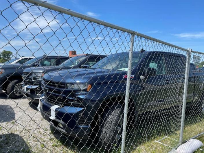 FILE PHOTO: General Motors pickup trucks awaiting missing parts are seen in Fort Wayne