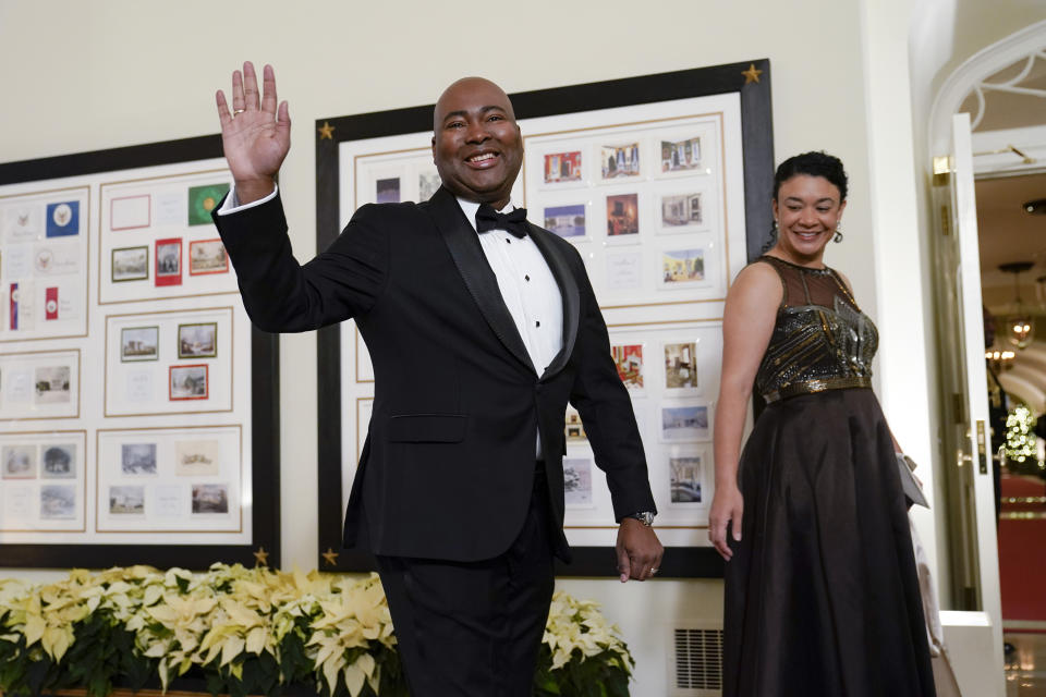 Democratic National Committee chair Jaime Harrison and his wife Marie Boyd arrive for the State Dinner with President Joe Biden and French President Emmanuel Macron at the White House in Washington, Thursday, Dec. 1, 2022. (AP Photo/Susan Walsh)