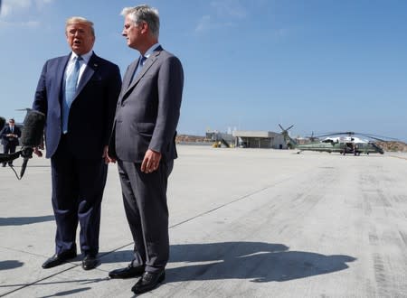 U.S. President Trump faces reporters with new national security adviser O'Brien at Los Angeles International Airport in Los Angeles California