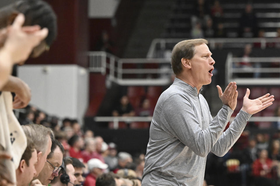 Oregon head coach Dana Altman cheers after a basket during the first half of an NCAA college basketball game against Stanford, Thursday, Feb. 22, 2024, in Stanford, Calif. (AP Photo/Nic Coury)