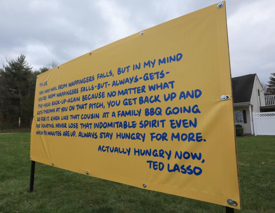 A billboard with an inspirational message from the television character Ted Lasso to US Mens National Soccer Team member Tyler Adams posted across from Roy C. Ketcham High School in Wappingers Falls on November 18, 2022.