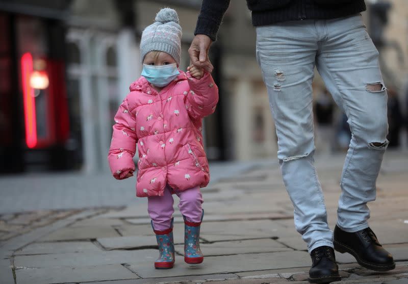 A child wears a mask as the spread of the coronavirus disease (COVID-19) continues in Durham