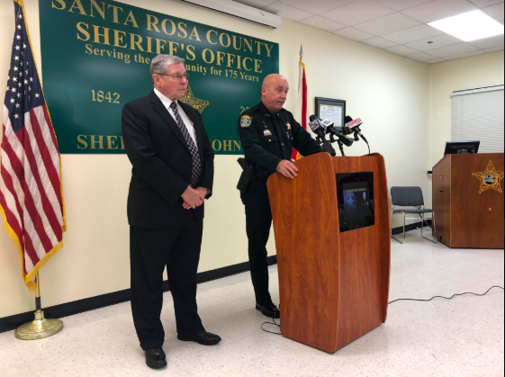 State Attorney Bill Eddins, left, and Santa Rosa County Sheriff Bob Johnson, right, hold a press conference Monday about the arrest of 86-year-old Ramona Maxine Lund. Ramona was arrested and charged with the beating death of her husband, 89-year-old Francis Lund.