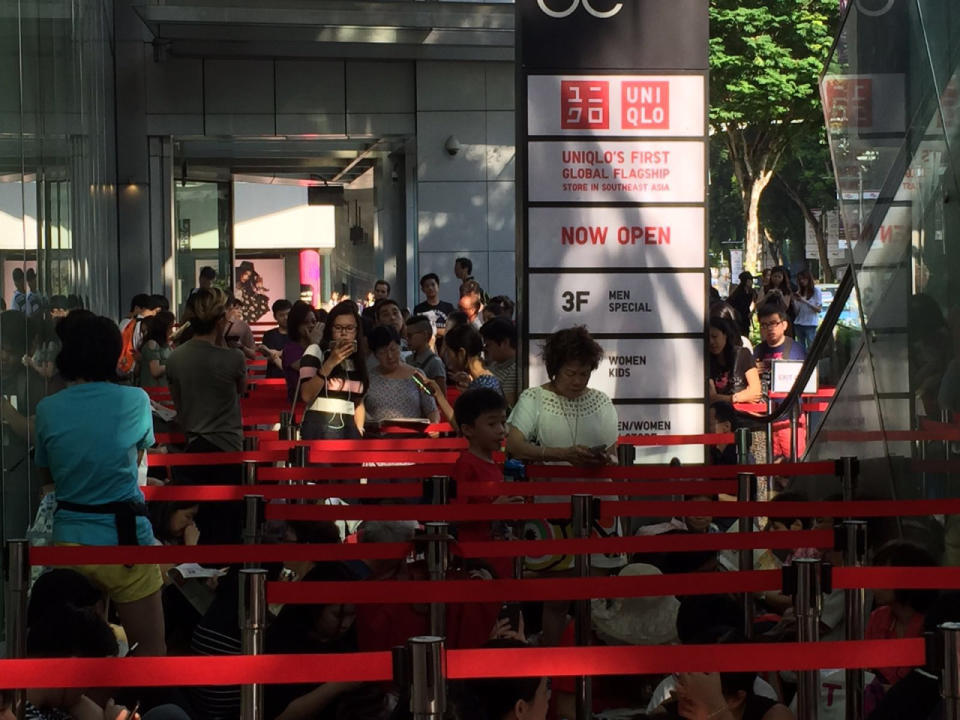 People queued as early as 7am on Friday (2 Sept) for the opening of Uniqlo’s global flagship store in Singapore, located at Orchard Central. (Photo: Lynda Hong/Yahoo Singapore)