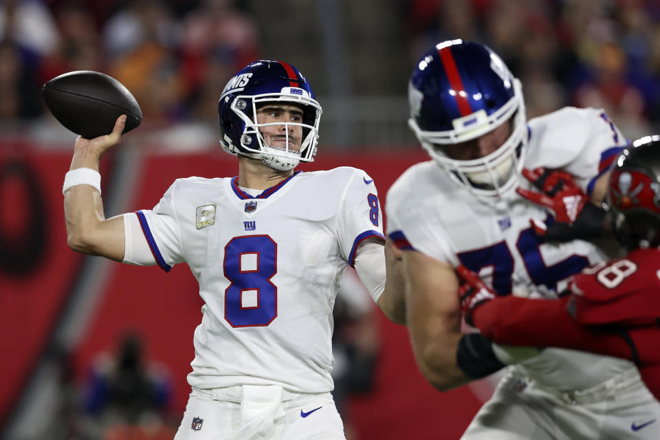 New York Giants quarterback Daniel Jones (8) throws a pass against the Tampa Bay Buccaneers during the first half of an NFL football game Monday, Nov. 22, 2021, in Tampa, Fla. (AP Photo/Mark LoMoglio)
