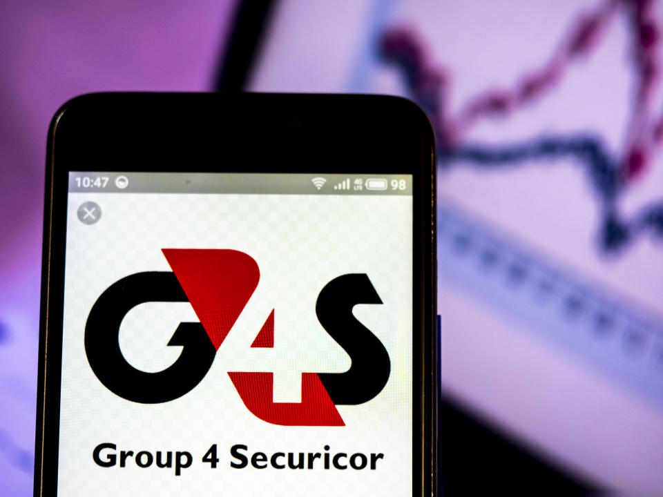 UKRAINE - 2019/03/09:  In this photo illustration, the G4S plc company logo seen displayed on a smartphone. (Photo Illustration by Igor Golovniov/SOPA Images/LightRocket via Getty Images)