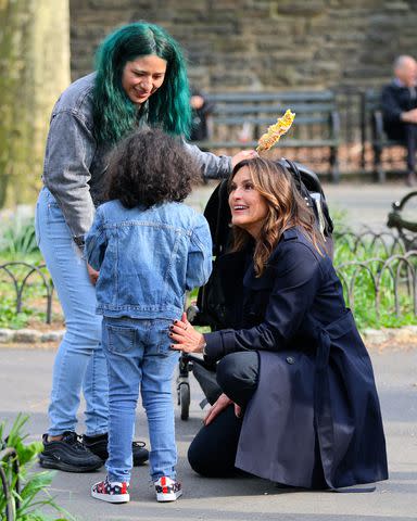 <p>Jose Perez/Bauer-Griffin/GC</p> Mariska Hargitay is seen taking a break from filming 'Law and Order: SVU' help a child at the Fort Tryon Playground on April 10, 2024 in New York City.