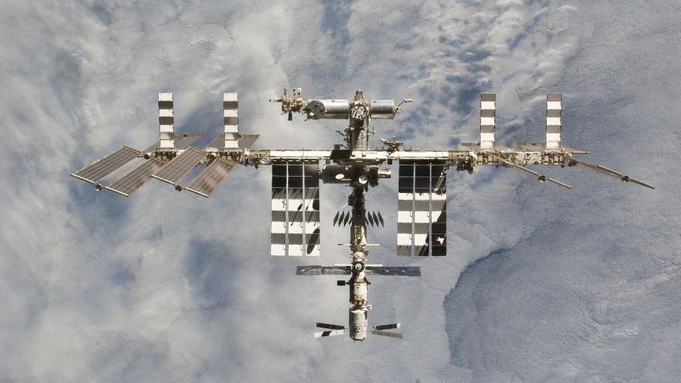  The international space station as photographed while looking down at Earth. 