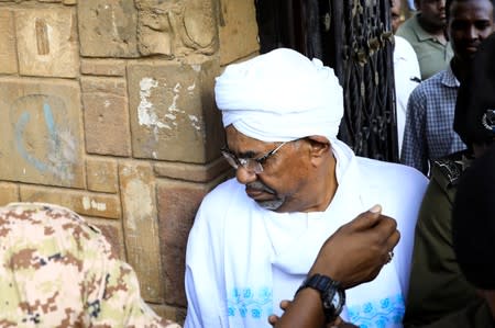 Sudan's ex-president Omar al-Bashir leaves the office of the anti-corruption prosecutor in Khartoum