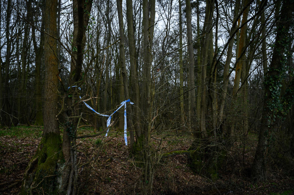 ASHFORD, ENGLAND - MARCH 10: Police tape is seen at one of the search sites near to a disused paintball centre on Bears Lane, near Great Chart Golf and Leisure during an investigation into the disappearance of a woman, Sarah Everard, last week in South London, on March 10, 2021 in Ashford, England. The police have confirmed that human remains have been found in woodland nearby. A Metropolitan police officer has been arrested in connection with the case. Ms Everard, 33, from Brixton, London, has been missing since leaving a friend's home in Clapham on Wednesday, March 3. She was last seen at about 21.30 GMT, wearing a green rain jacket, navy blue trousers with a white diamond pattern, turquoise and orange trainers, a white beanie hat and possibly wearing green earphones. (Photo by Leon Neal/Getty Images) (Photo by Leon Neal/Getty Images)