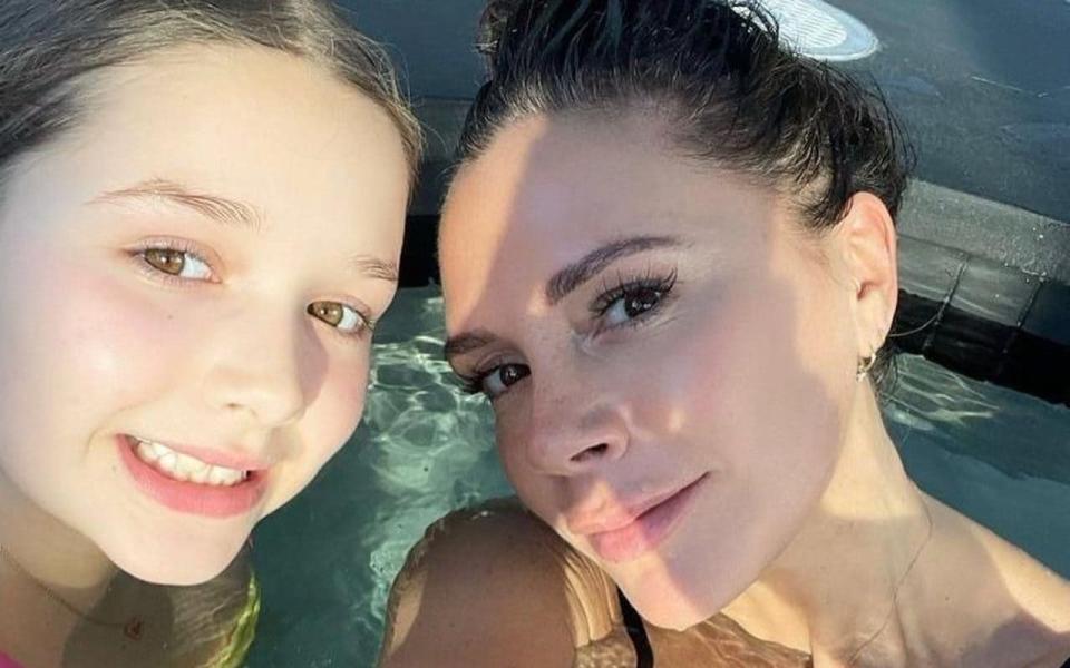 Victoria Beckham and daughter Harper pose for the selfie