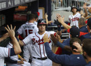 Atlanta Braves' Austin Riley is congratulated after his two-run home run against the St. Louis Cardinals during the first inning of a baseball game Tuesday, July 5, 2022, in Atlanta. (Curtis Compton/Atlanta Journal-Constitution via AP)