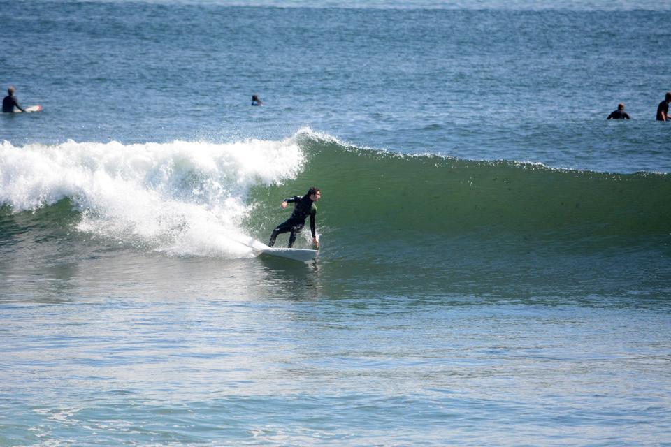 Surfer Mikel Evans, captured at Fox Hill in Rye by longtime surfer and photographer Ralph Fatello who documents surfing on the New Hampshire coast.