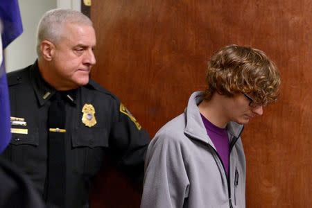 Christopher Leonard (R) appears in court to give a sworn testimony during a felony hearing for his half-sister, Sarah Ferguson in New Hartford, New York October 21, 2015. Leonard's older brother Lucas died after allegedly being beaten for hours during a family counseling session inside the "sanctuary room" of an upstate Christian church, police said on Wednesday. REUTERS/Tina Russell/Observer-Dispatch/Pool