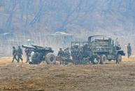 South Korean soldiers man a cannon at a military training field in the border city of Paju on April 5, 2013