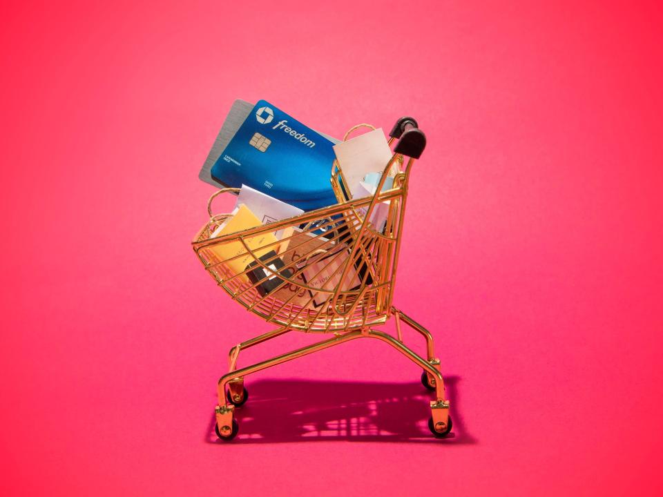 shopping cart with bags and credit cards