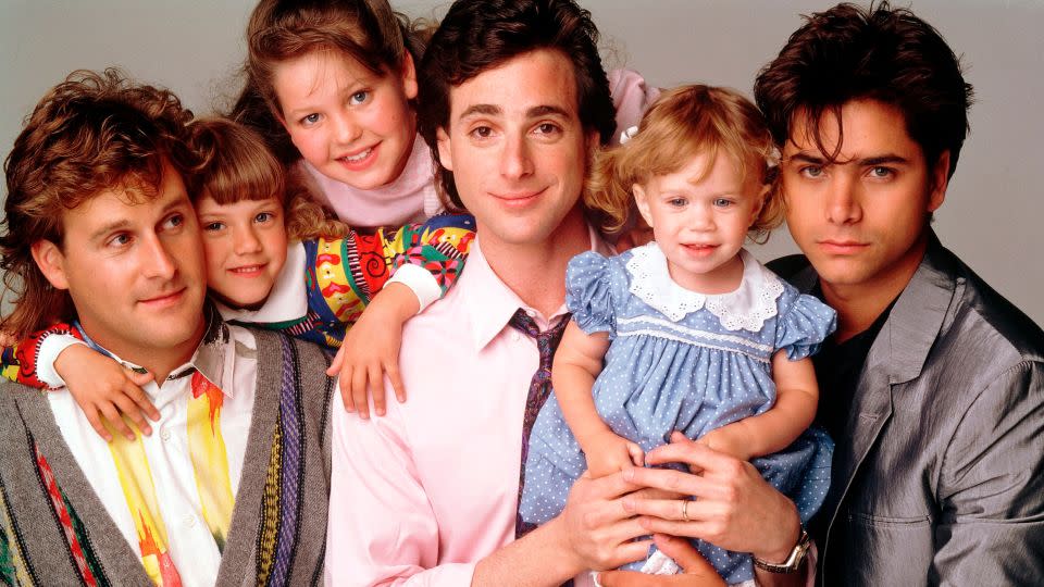 (From left) Dave Coulier, Jodie Sweetin, Candace Cameron Bure, Bob Saget, Mary-Kate/Ashley Olson and John Stamos in 'Full House.'  - ABC/Getty Images