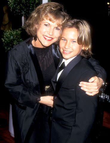 <p>Ron Galella, Ltd/Ron Galella Collection/Getty</p> Jonathan Taylor Thomas and mom Claudine Weiss in 1992