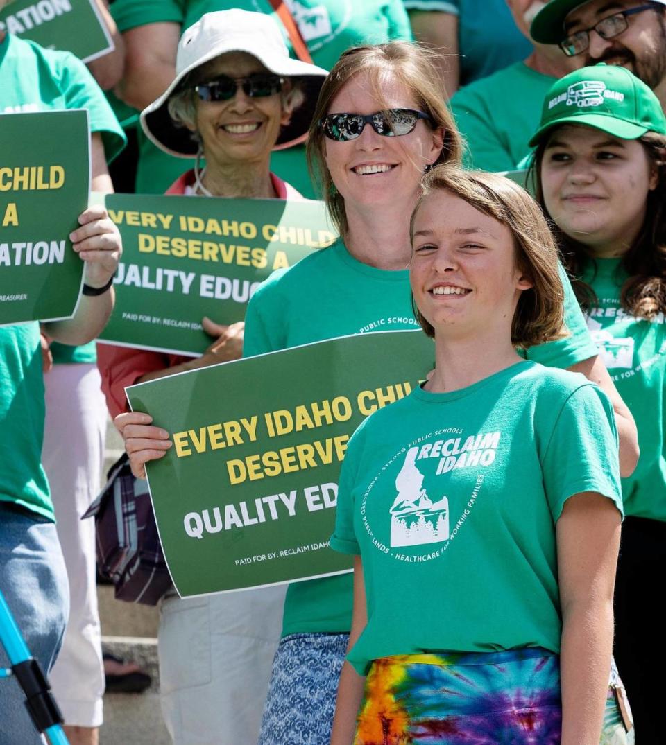 Anise Welty, 13, to waits to speak at a Reclaim Idaho press conference at the Idaho Capitol on Wednesday, July 6, 2022. With her mother, Welty helped collect a portion of the over 100,000 signatures for the group’s Quality Education Act initiative.