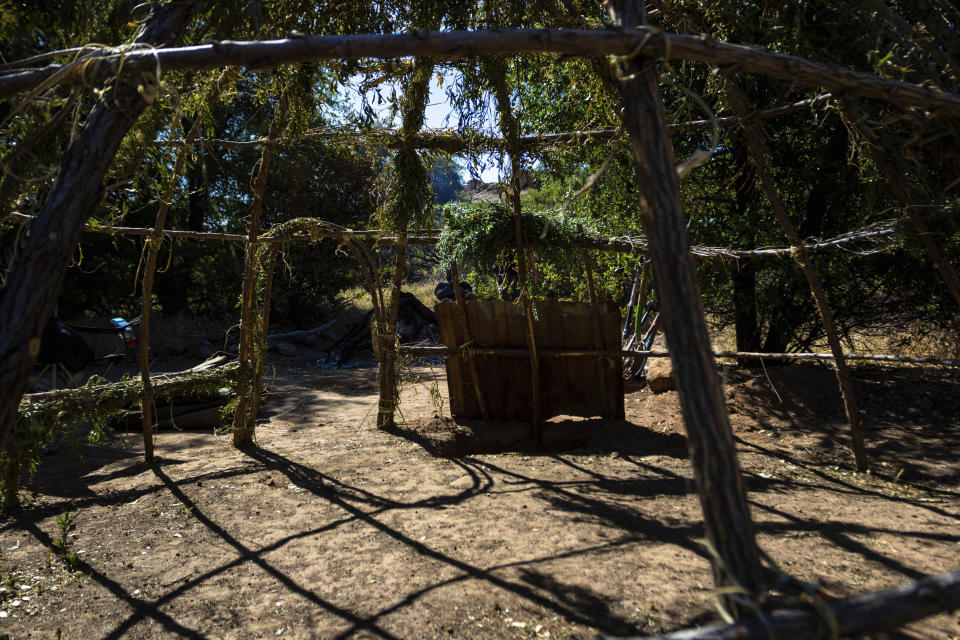 A sweat lodge is constructed on Oak Flat Campground, a sacred site for Native Americans located 70 miles east of Phoenix, on June 3, 2023, in Miami, Ariz. (AP Photo/Ty O'Neil)