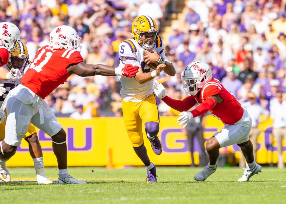 Quarterback Jayden Daniels runs the ball as the LSU Tigers take on the Ole Miss Rebels at Tiger Stadium in Baton Rouge, Louisiana, USA.Saturday October 22, 2022