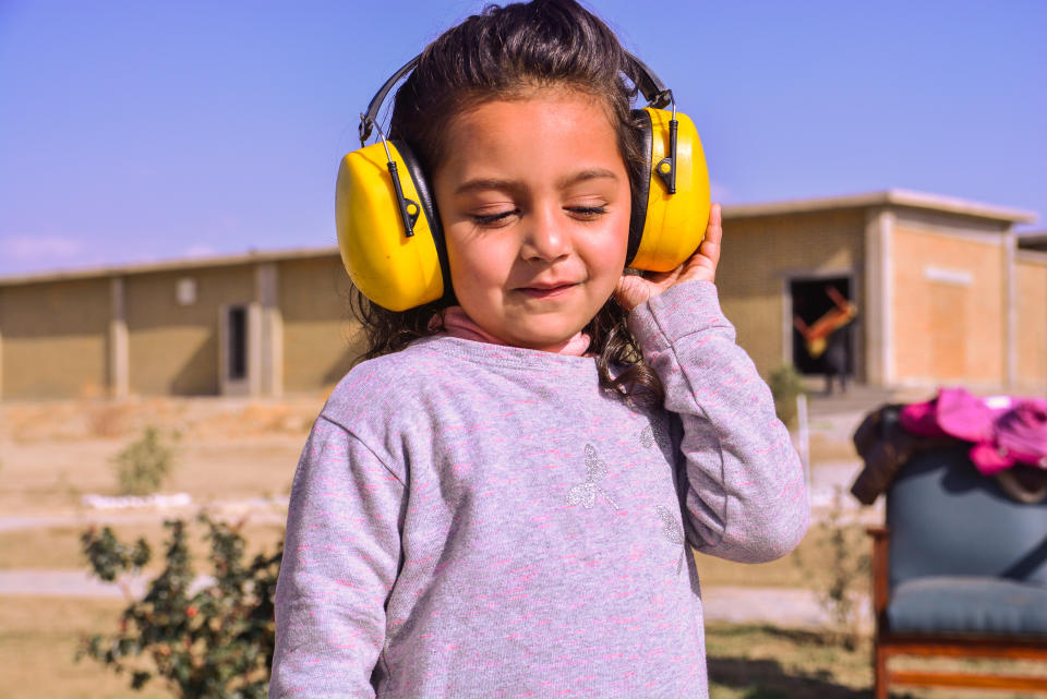 Equipment like noise-cancelling headphones can help neurodiverse children feel less overwhelmed. (Getty Images)