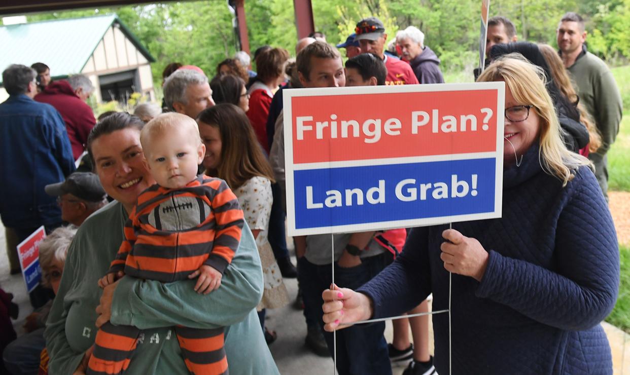 Landowners from southwest Ames and Washington Township gather for a meeting against the City of Ames' Urban Fringe Plan and land rights at Raspberry Hill on 240th St. on Thursday, May 26, 2022, in Ames, Iowa.