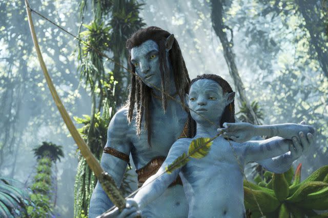 <p>Walt Disney Studios Motion Pictures / Courtesy Everett</p> A still from 'Avatar: The Way of Water' including Jake Sully (Sam Worthington) and Neteyam (Jamie Flatters)