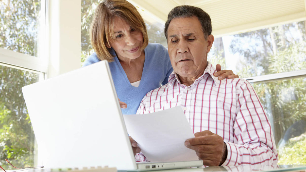 Couple Working In Home Office