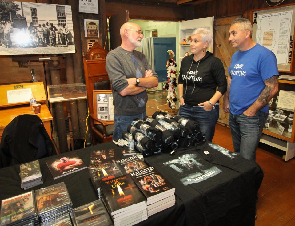 Jen Krystowski and Marcel Aube of Connecticut (center and right) talk with John Zaffis (left), a paranormal celebrity from SyFy's "The Haunted Collector," at a previous ParaFest at Dundee's Old Mill. This year's event is Nov. 11 and will again feature Zaffis.