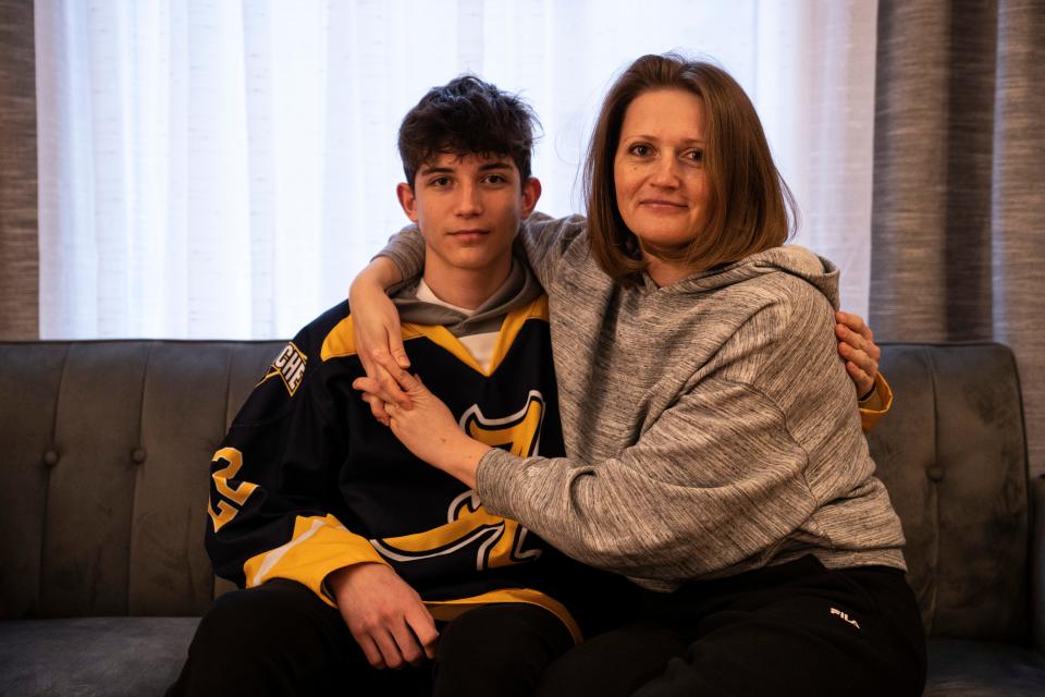 Max Tkachuk and his mom Iryna at their home in Fort Lee on Wednesday, February 22, 2023. Tkachuk and his family have watched from afar as their home country fights through the Russian war.