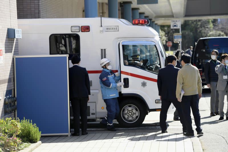 An ambulance carrying a Japanese national who evacuated from Wuhan by a chartered plane, arrives at a hospital in Tokyo