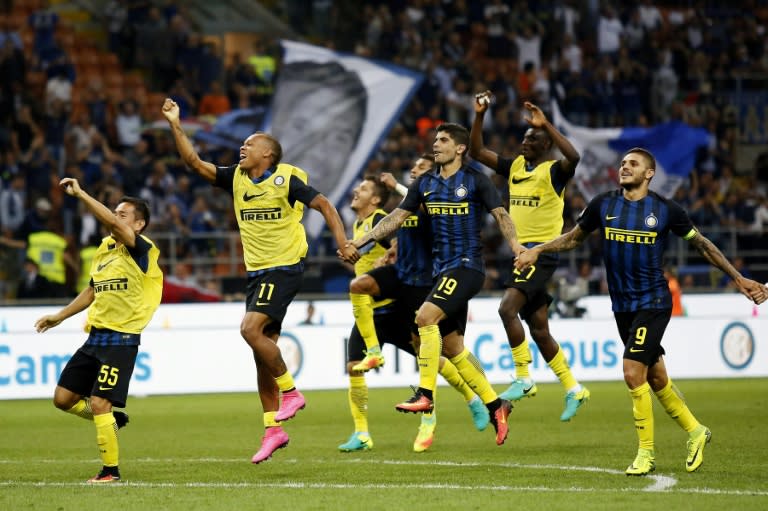 Inter Milan celebrate after beating Juventus at the 'San Siro Stadium' in Milan